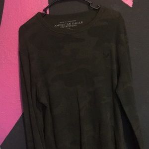 Men’s green long sleeve shirt.